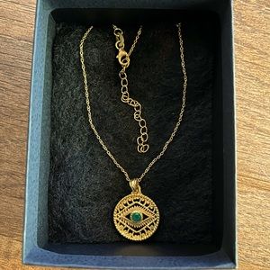 Onyx evil eye pendant necklace.